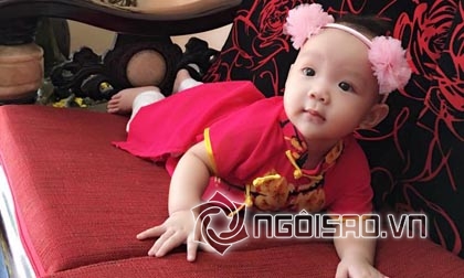 Con gái Trịnh Kim Chi đáng yêu khi diện áo dài đón Tết