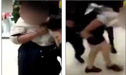 Cô gái trẻ bị đánh ghen, lột  quần áo giữa trung tâm mua sắm