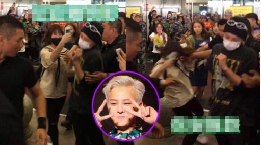 G-Dragon (Big Bang) bị tố thô bạo đẩy fan nữ ngã mạnh xuống sàn