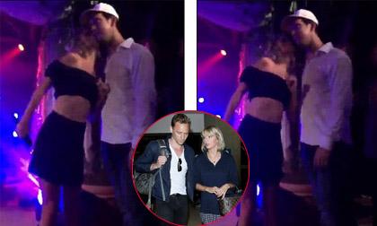 Vắng Tom, Taylor Swift bị bắt gặp hôn trai lạ giữa đêm tiệc