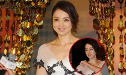 Đổng Tuyền lúng túng với váy trễ 