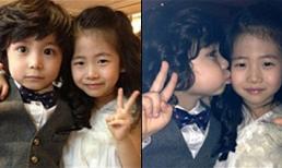 Sao nhí Mason thơm má 'bạn gái'