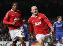 Rooney qua mặt Torres