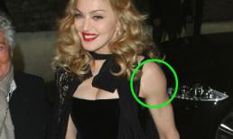 Madona "khoe" tay cơ bắp trong buổi ra mắt phim