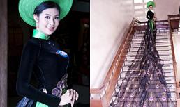 Hoa hậu Ngọc Hân mặc áo dài  “Con công” dài 39m