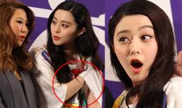 Phạm Băng Băng vô tư thò tay chỉnh áo tại sự kiện