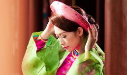 Quỳnh Thy nền nã với áo dài