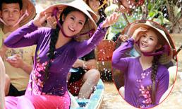 Ngắm hoa hậu Ngọc Hân đẹp rạng ngời trên sông nước
