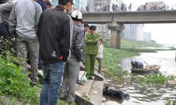 Phát hiện xác chết bị đeo đá trên sông Đáy