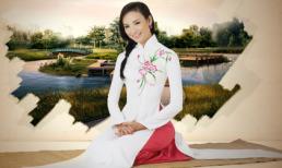 Hoa hậu Ngọc Diễm e ấp trong tà áo dài