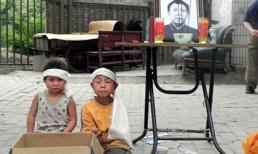 Xót xa cảnh con thơ quỳ trên phố xin tiền chôn bố