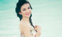 Bắt gặp Hoa hậu Ngọc Diễm dạo chơi bên bờ biển với trang phục mát mẻ