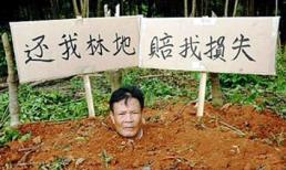 Tự đào hố... chôn mình để giữ đất