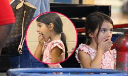 Suri vừa đi vừa...xỉa răng