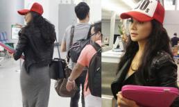 Thanh Hằng "nổi bần bật" tại sân bay tối với style độc đáo