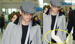 TOP (Big Bang) xuất hiện với cánh tay băng bó sau khi ra viện
