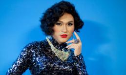 Đại Nghĩa tô son đỏ, mặc áo dài khoe... đường cong