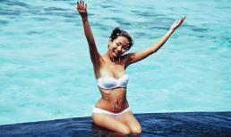 Thảo Trang diện bikini tung tăng đùa giỡn sóng nước Maldives