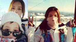 Hai mẹ con Triệu Vy xì-tin chụp ảnh khi đi trượt tuyết