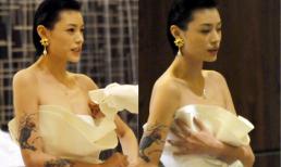 Sao nữ chăm chăm chỉnh váy vì sợ hớ hênh