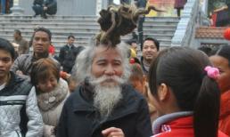 'Dị nhân' tóc búi hình rồng, rắn xuất hiện ở hội Lim