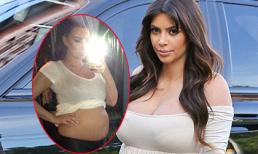 Kim Kardashian vén áo "tự sướng" khoe bụng bầu "tròn ủng"