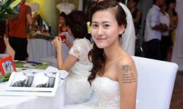 Hot girl Hà Lade diện váy cưới, lộ hình xăm hoa cúc