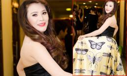 Hồ Quỳnh Hương tươi tắn khoe váy cánh bướm trong hậu trường