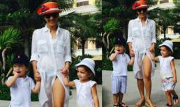 Hồng Nhung 'thả dáng' gợi cảm khi cho hai con đi biển