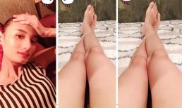 Lê Thúy khoe khéo đôi chân dài 1m14