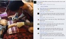 Clip bố dẫn con 4 tuổi đi xăm hình gây tranh cãi