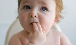 Dấu hiệu nhận biết sớm con mọc răng