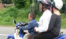 Cậu bé 5 tuổi điều khiển xe máy chở 2 người lớn gây sốc