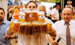 Lập kỷ lục bưng 27 vại bia nặng 62kg trên quãng đường 40m