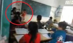 Một giáo viên dùng sách đánh vỡ đầu học sinh