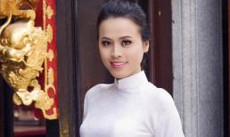 Ivy Trần thướt tha trong BST áo dài “ Đón Xuân 2014” 