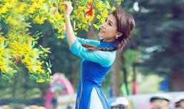 Á khôi Hoàng Y Nhung diện áo dài cực xinh đón Tết