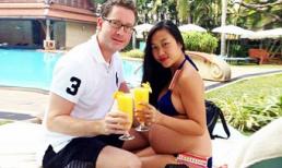 Đoan Trang lộ bụng bầu 6 tháng tròn lẳn bên chồng Tây