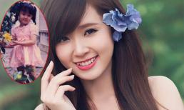 Midu khoe ảnh ngày bé đón Tết xinh như công chúa