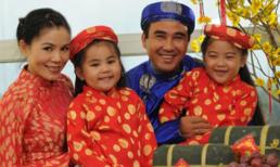 Nhóc tỳ của sao rạng rỡ với áo dài khăn đóng