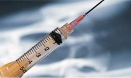 Trấn lột bằng kim tiêm trên xe buýt