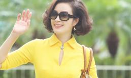 MC Thanh Mai diện đầm vàng trẻ trung xuống phố