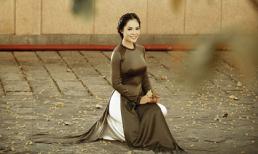 Dương Cẩm Lynh đẹp cổ điển với áo dài nâu