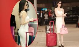 Ngọc Trinh diện "cây trắng tinh", một mình đứng đợi ở sân bay