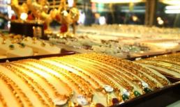 Vàng tăng mạnh, USD sụt giá