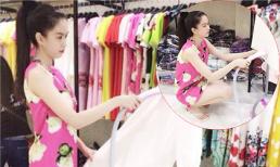 Ngọc Trinh tự tay ủi đồ cho khách ở cửa hàng