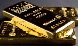 Vàng đổ dốc sau tuyên bố của Fed