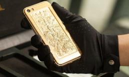 Mở hộp iPhone 5s tranh chạm bằng vàng khối ở Việt Nam