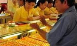 Vàng tạm lắng, USD vẫn giảm không ngừng 