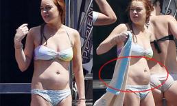Lindsay Lohan lộ bụng "tròn ủng" như có bầu